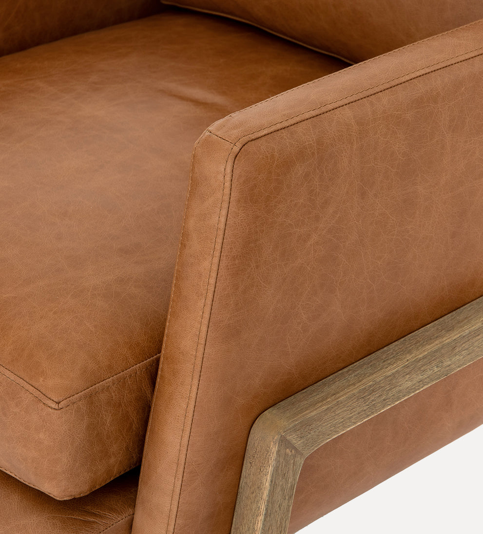 butterscotch-colored leather chair
