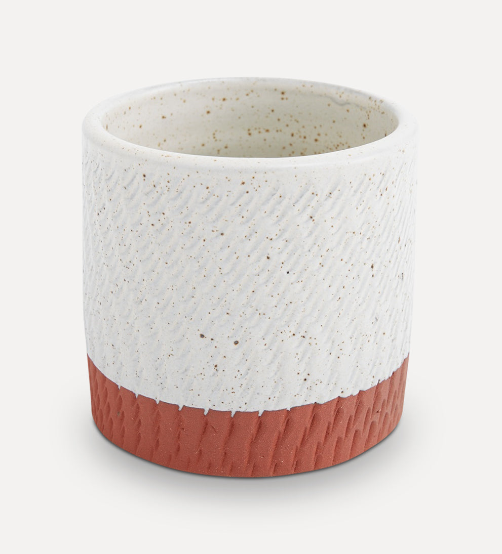 Terracotta coloring and speckle textured ceramic pot