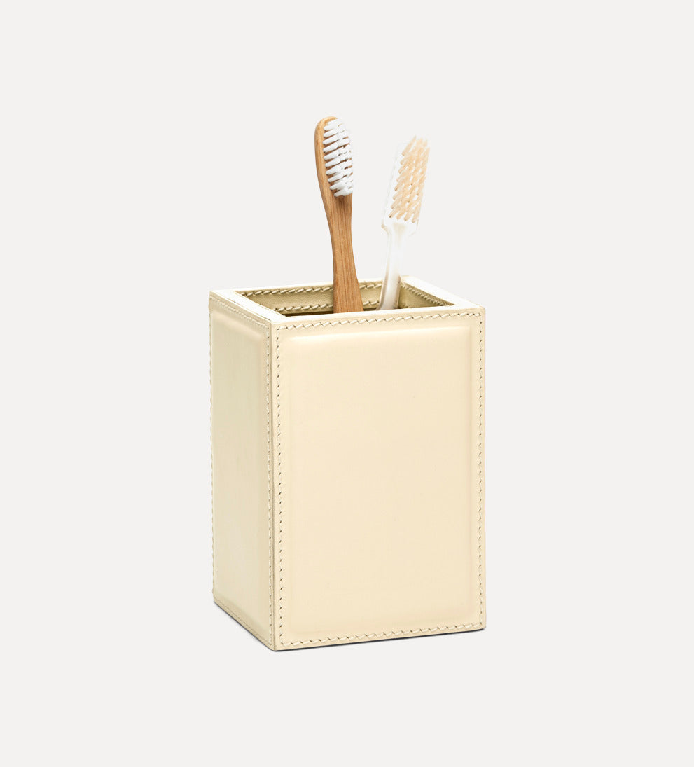 cream padded leather brush holder